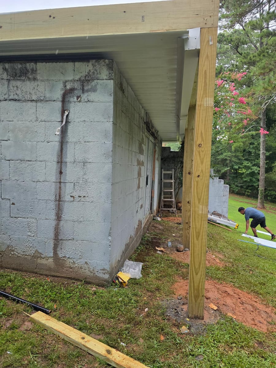 Deck built over existing block walls, with underdecking forming a covered space below, Austell, Georgia