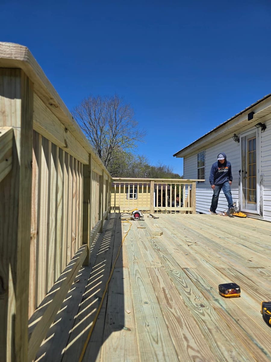 Large low deck stripped to the frame and re-boarded with new railings, Chatsworth, Georgia