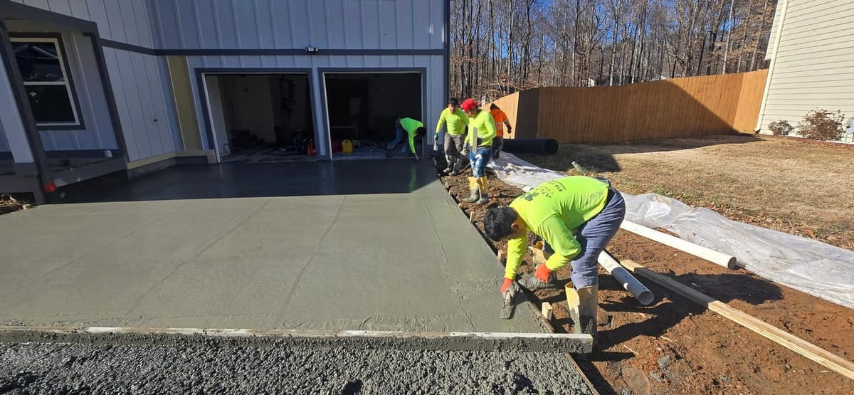 Screeding the wet concrete, Duluth, Georgia