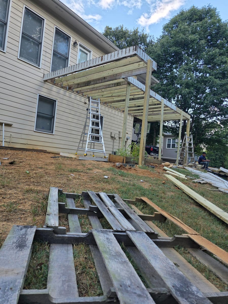 Old boards stripped and stacked on the lawn, Kingston, Georgia