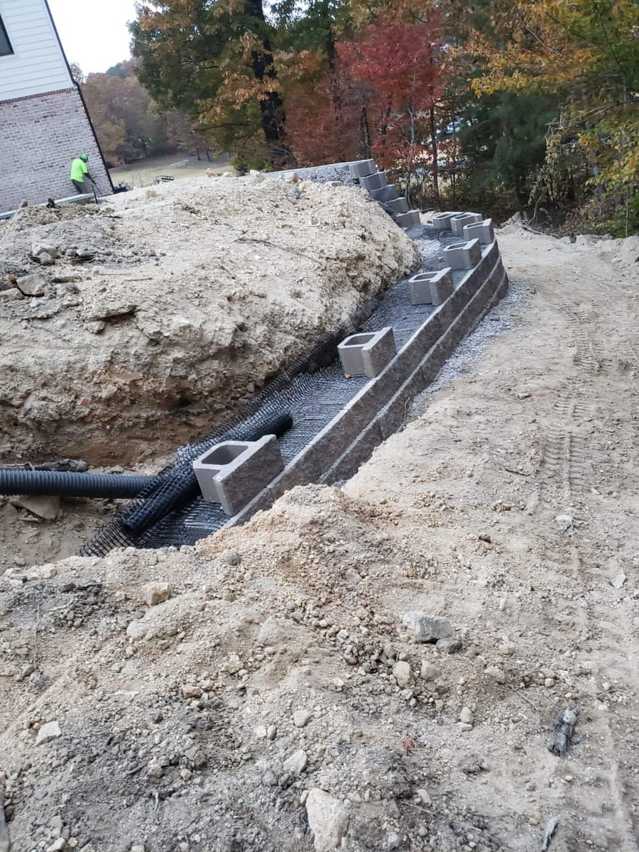Segmental block retaining walls with drainage, several runs across sloping ground, Ringgold, Georgia